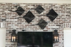 handcrafted metal stingray sculptures on designer coastal porch